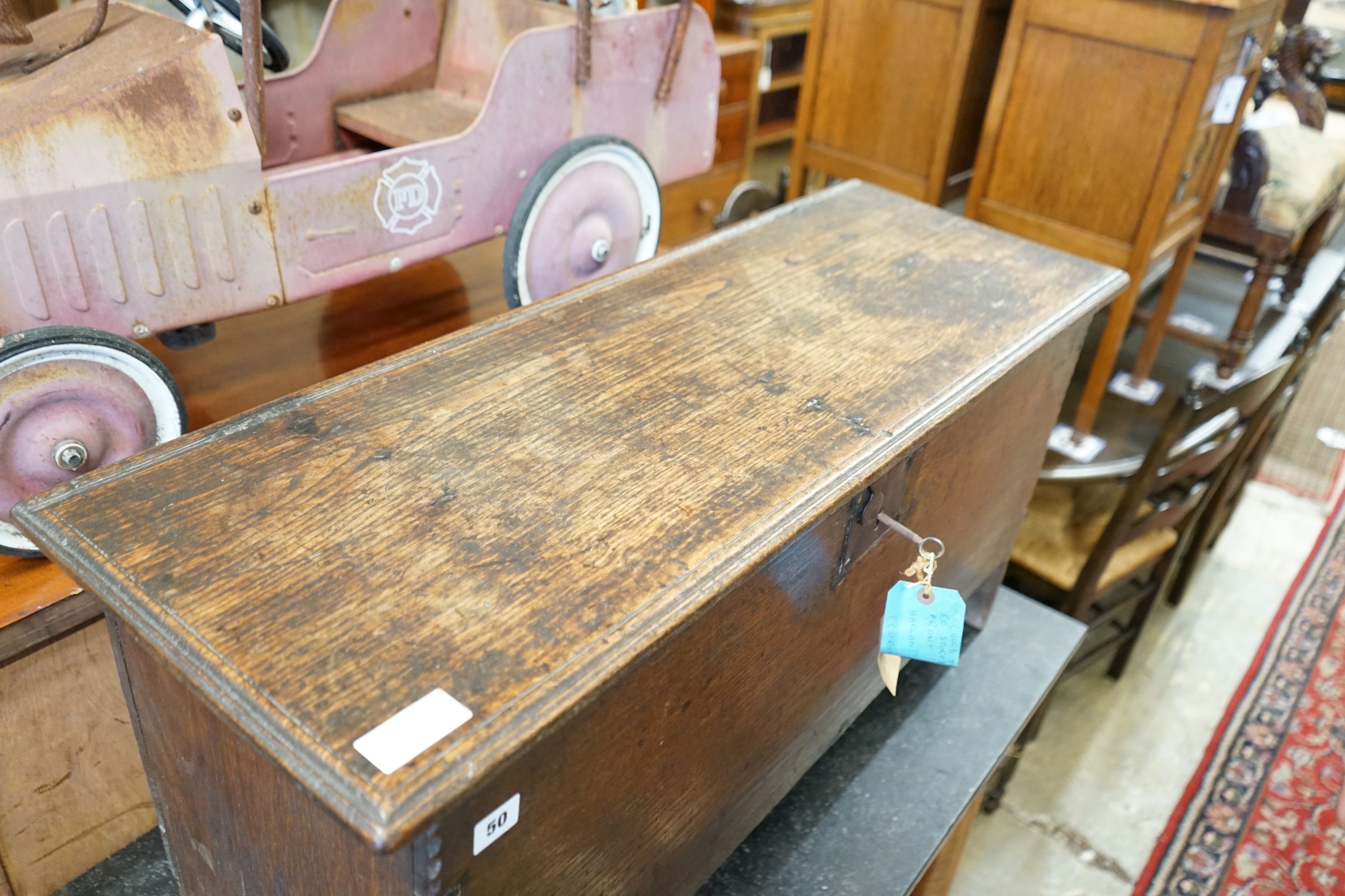 A late 17th / early 18th century oak six plank chest, length 98cm, depth 36cm, height 49cm